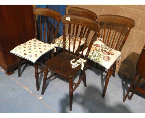 Set of four elm seat stick back Windsor chairs.