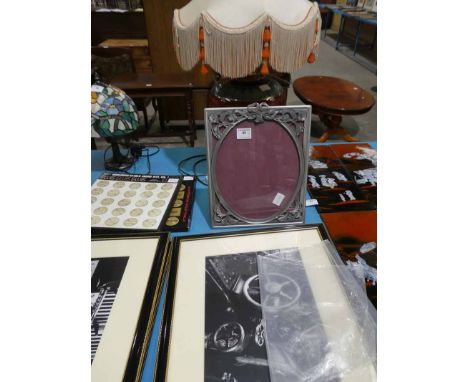 A mixed lot including large table lamp, pewter picture frame, and 2 Elvis box sets of records and a set of 4 railway photo pr