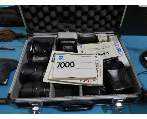 A selection of photographic equipment including case, Minolta 7000 camera set, lenses, flash and other accessories. Also koda