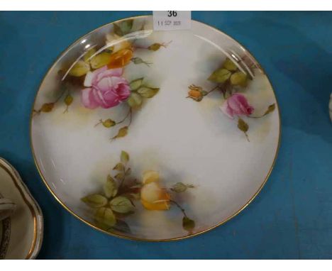A Royal Worcester hand painted rose plate, unsigned though date marked for 1913, 23 cm dia.