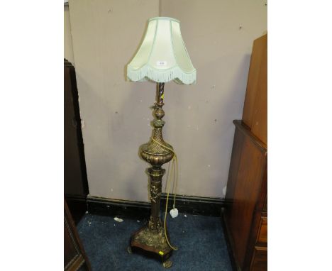 AN UNUSUAL METAL STANDARD LAMP AND SHADE