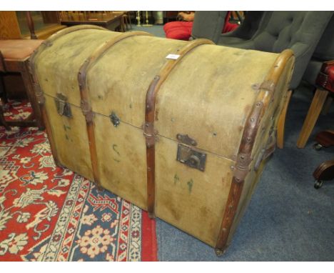 A VINTAGE DOMED AND BANDED STEAMER TRUNK - W 88 CM