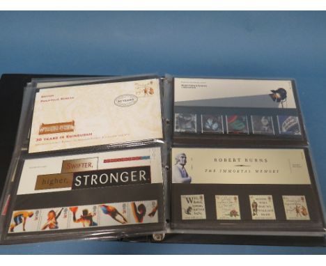 AN ALBUM OF FIRST DAY COVERS TO INCLUDE D-DAY