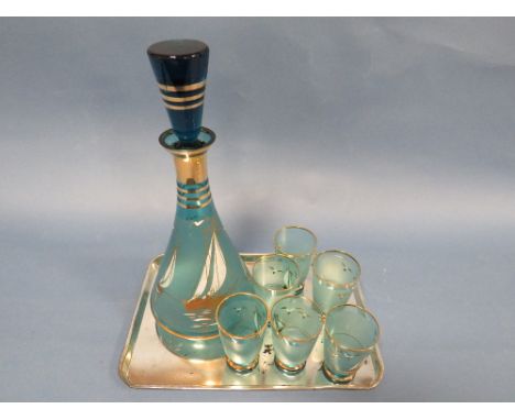 A RETRO SHIPS DECANTER WITH SIX GLASSES