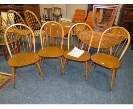 A SET OF FOUR ERCOL WINDSOR CHAIRS