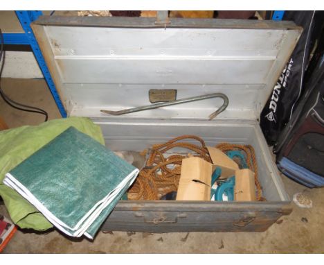 A LARGE STEEL FRAMED TRAVELLING TRUNK WITH ROPE, CROWBAR ETC