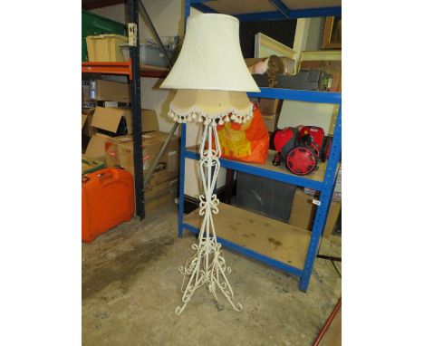 A VINTAGE WROUGHT IRON FLOORSTANDING LAMP