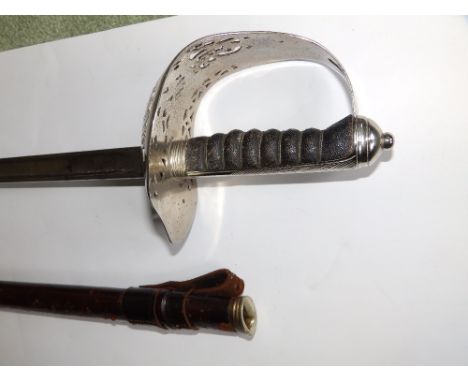 A King George V Infantry Officer's sword in leather bound scabbard, the 32.5” patterned blade by Wilkinson.