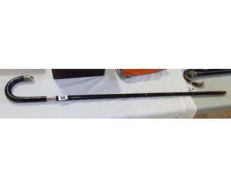 A silver mounted walking stick.