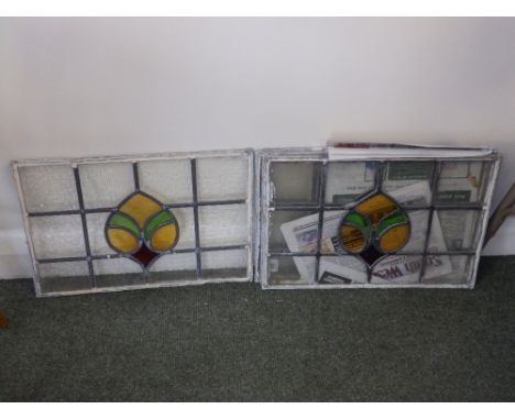 A set of five small stained glass leaded light window panels.