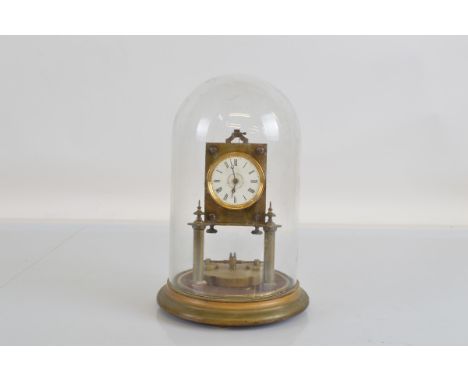 A brass 100 Hour clock, white enamel dial with Roman numerals, marked RL.Patent 2182. US Patent 269052. DR Patent 2437. Missi