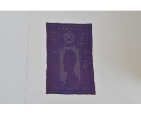 An Edward VIII Royal purple Coronation commemorative handkerchief, with pierced decoration to reveal Monarch's profile and cr