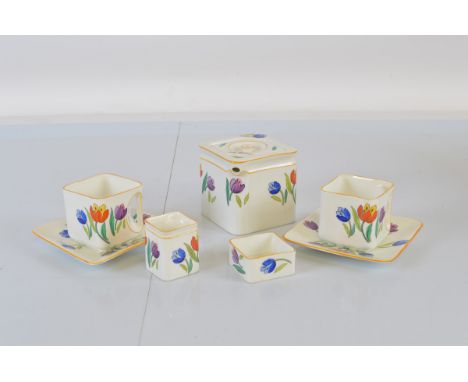 A Foley China "The Cube" tea for two service, comprising teapot (lid AF), milk and sugar with two cups and saucers, with pain