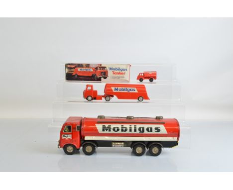 An unboxed Hayashi Manufacturing (Japan) tinplate 'Mobilgas' eight wheel tanker model, 37.5cm long and a Wells Brimtoy 'Esso'