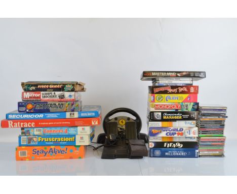 A good quantity of  early PC Games and software together with traditional games, A  'TV Boy' gaming console containing 126 vi