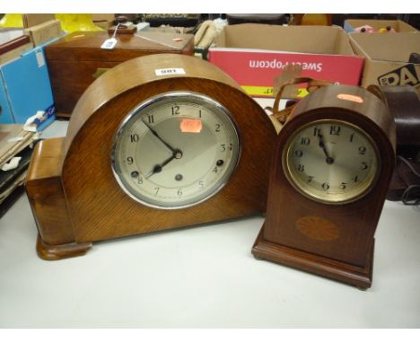 AN ART DECO OAK MANTEL CLOCK, silvered dial and Westminster chiming (key and pendulum) and an Edwardian inlaid mahogany arch-
