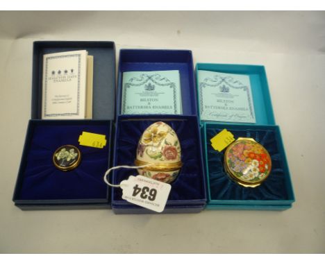 A SMALL BOXED HALCYON DAYS ENAMEL BOX, floral design and two boxed Bilston & Battersea enamel boxes, one egg shaped (3) 