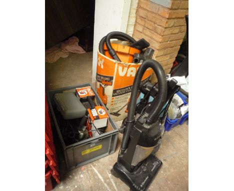 A BOX OF POWER TOOLS, including Bosch, Black and Decker and three various vacuums