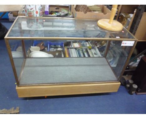 A LIGHT OAK AND BRASS FRAMED GLAZED HABERDASHERY/SHOP DISPLAY COUNTER