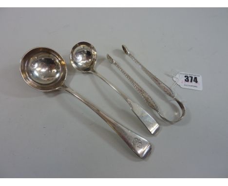 A GEORGE III SCOTTISH SILVER SAUCE LADLE, another sauce ladle and a pair of bright cut sugar nips (3)
