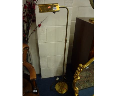 A BRASS TELESCOPIC FLOOR STANDING READING LAMP, and a brass circular swivel mirror (2)