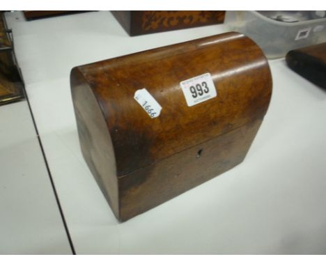 A VICTORIAN WALNUT DOME TOPPED TEA CADDY, enclosing twin division