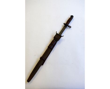 A 1917 PATTERN BAYONET, with scabbard, all correct marks, wooden two screw grip, two groove, Remington circular stamp on hilt