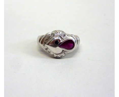 A 9CT GOLD RUBY AND DIAMOND RING, the tear drop shape ruby with single diamond detail, hallmarks for Birmingham, ring size N
