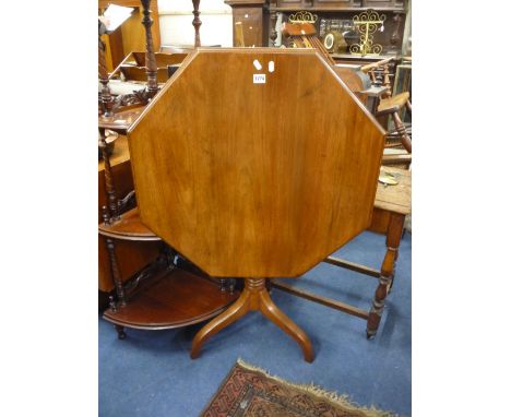 A 19TH CENTURY WALNUT OCTAGONAL TILT TOP TRIPOD TABLE
