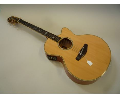 A YAMAHA CPX900NT ELECTRO-ACOUSTIC GUITAR, natural finish with cherry back and sides, rosewood fingerboard with mother of pea