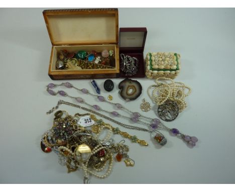A COLLECTION OF JEWELLERY, to include semi-precious gemstone jewellery, a jet memorial locket together with paste and imitati