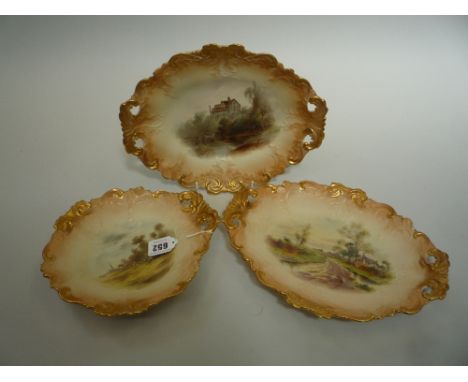 A ROYAL WORCESTER BLUSH IVORY DISH, c.1905, painted with a scene titled 'Old Mill, Straford on Avon', together with two simil