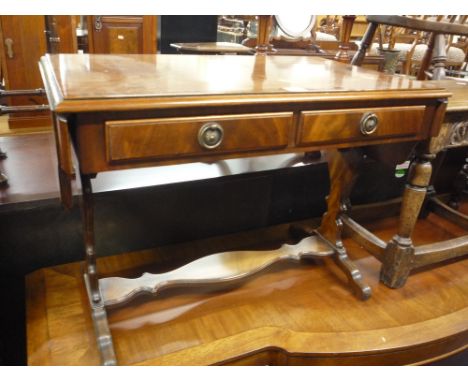A SMALL MAHOGANY CROSSBANDED SOFA TABLE, with two drawers, shaped supports and stretcher