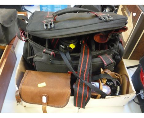 A NIKON F601 SLR CAMERA, with Nikkor 28mm 2.8, 50mm 1.8 and 35-105mm 3.5-4.5 lenses, a Speed light SB-22 flash and various ac