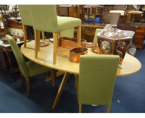 A LIGHT OAK OVAL DINING TABLE, and six green upholstered chairs (7)