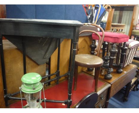 AN EBONISED CORNER DROP LEAF TABLE, two chairs, two stools and a tilley lamp (6)