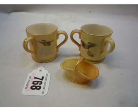 TWO ROYAL WORCESTER MINIATURE TYGS, hand painted with birds and a Royal Worcester blush ivory miniature basket (3)