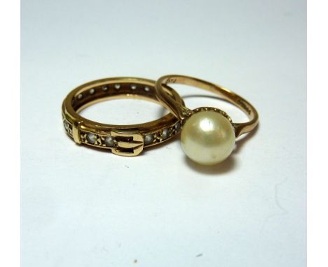 TWO RINGS, the first a single cultured pearl ring, together with a paste buckle ring, hallmarks to pearl ring for London, rin