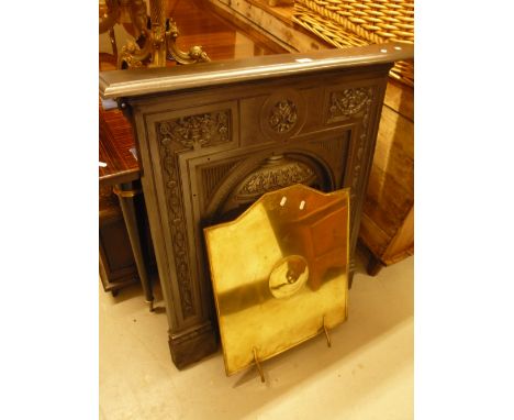 A CAST IRON FIRE SURROUND, brass fire screen etc (4)