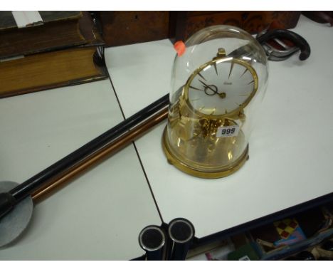 A DOMED KUNDO CLOCK, a silver mounted walking stick and a shooting stick (3)