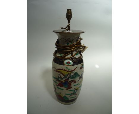 A CHINESE FAMILLE ROSE VASE, 1930's, converted to a table lamp, painted with a battle scene on a crackle glaze, height 45cm