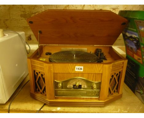 A STEEPLETONE CASED RECORD/CD/CASSETTE PLAYER