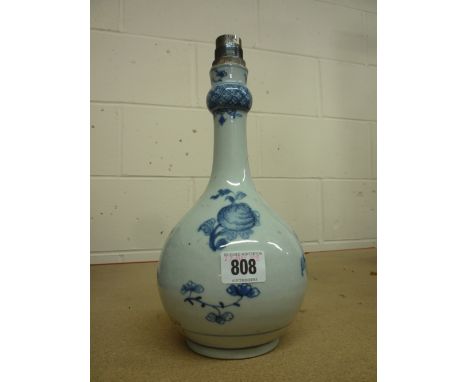 A CHINESE BLUE AND WHITE BOTTLE VASE, Qianlong, drilled and converted to a table lamp, height 24cm