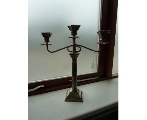 A SILVER TWO BRANCH THREE LIGHT CANDLEABRA, Birmingham 1977, the corinthian column with two wrythen reeded branches, corinthi