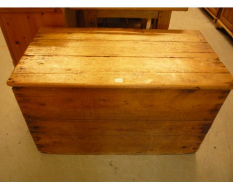 A LARGE PINE CHEST/TRUNK, with carrying handles
