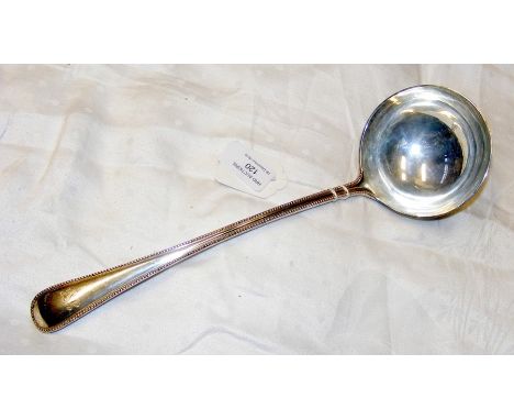 The matching large silver ladle - 9oz 