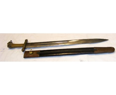 An antique French side arm with leather scabbard and stylized grip - 63cm long CONDITION REPORTseems ok