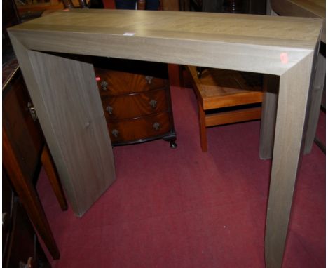 A pair of contemporary console tables