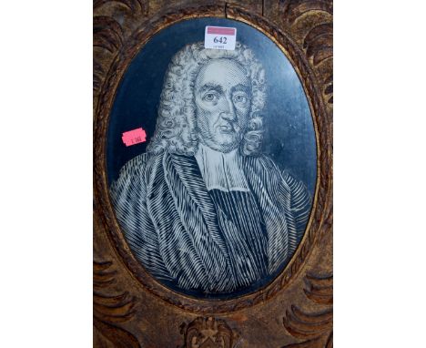 A George III cut paper portrait of a nobleman framed as an oval, 29x21.5cm, in gilt wood framed (frame a/f), picture with min