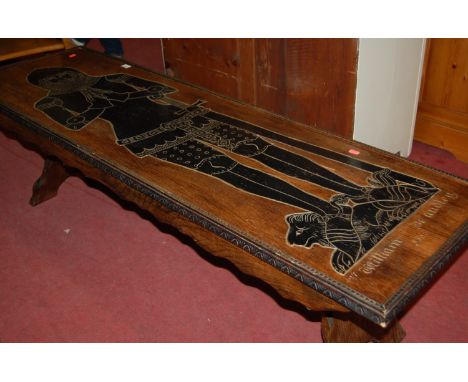 An oak rectangular long occasional table, the top with line carved and ebonised portrait of a medieval knight 